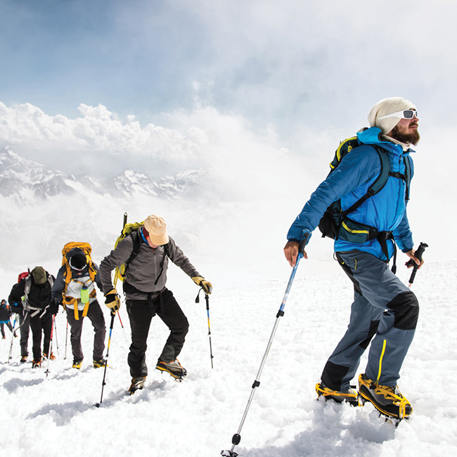 Group of skiers climbing over snow - Digital Advertising Naples, Florida